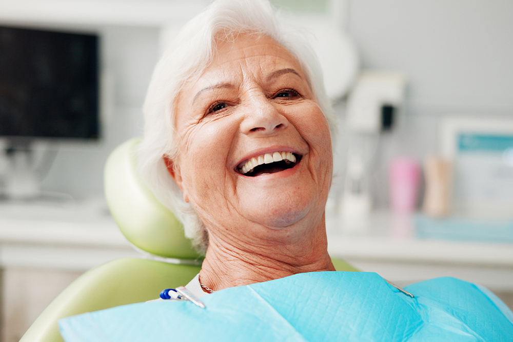 Dentist in Whitby examining urgent oral health warning signs at Birch Dental